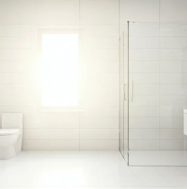 Cómo Limpiar el Baño a Fondo: Guía, Trucos y Productos 2 Baño moderno y limpio brillante iluminado por luz natural